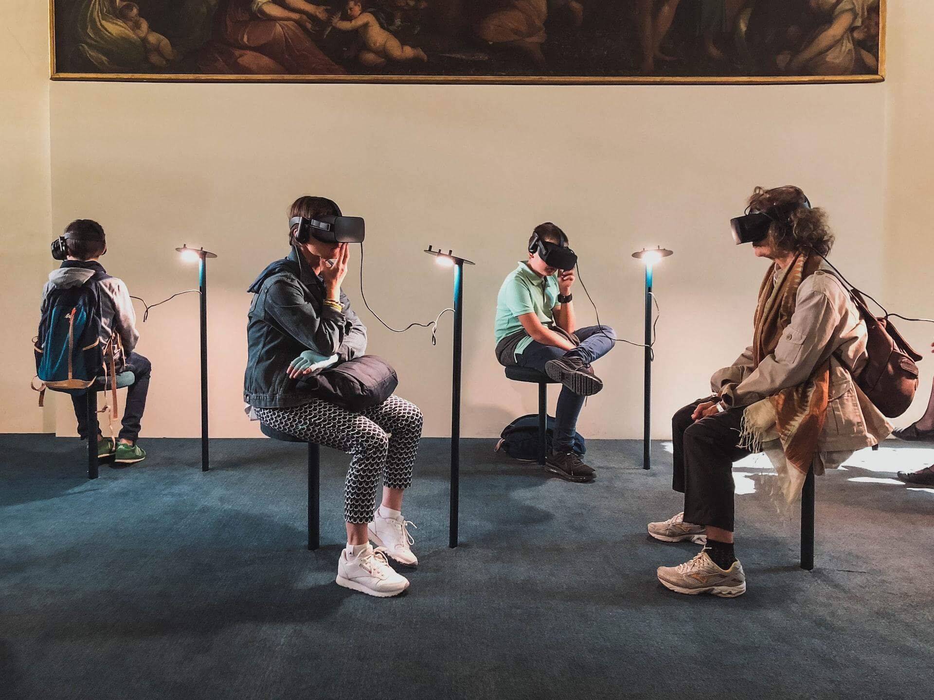 people using virtual reality in a room